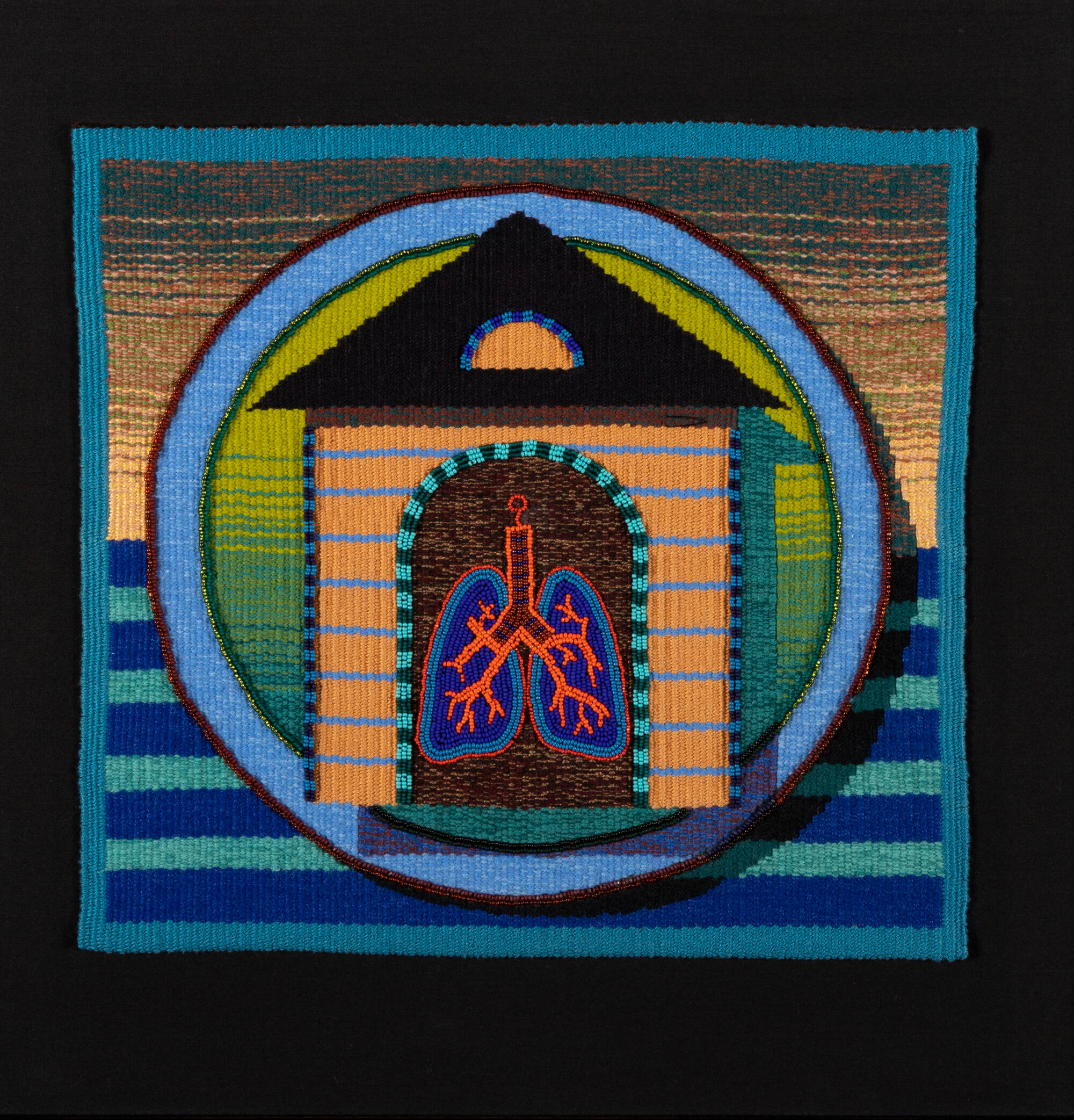 Woven textile with a house shape with lungs.